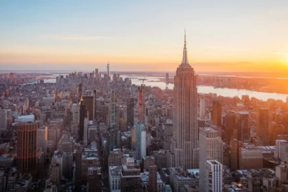 https://unsplash.com/photos/the-empire-state-building-shines-at-sunset-in-nyc-JUCIxMl7GMU